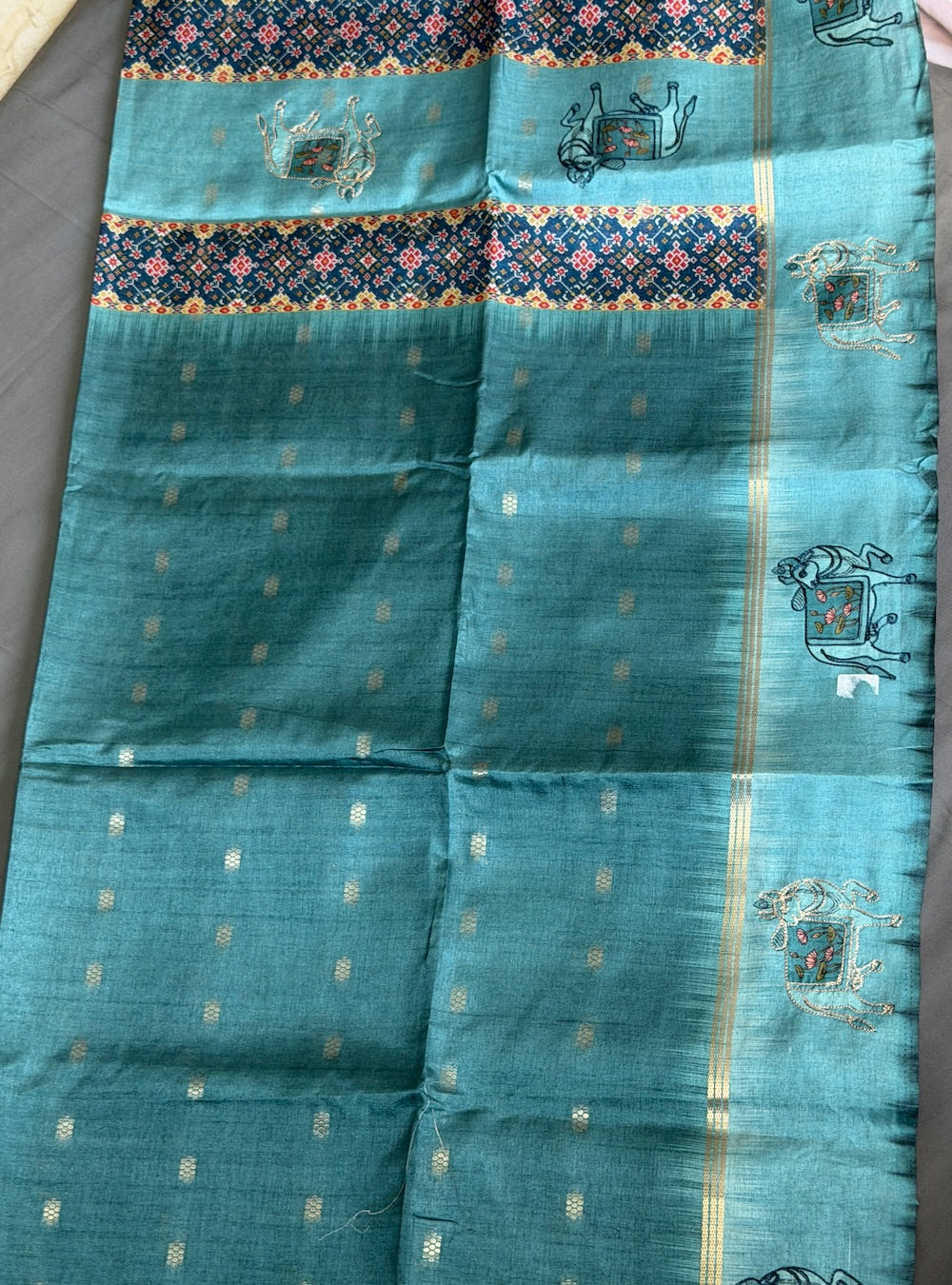 Teal Blue Colour Bagalpuri Silk Saree with Kamadhenu Golden Thread Weaving